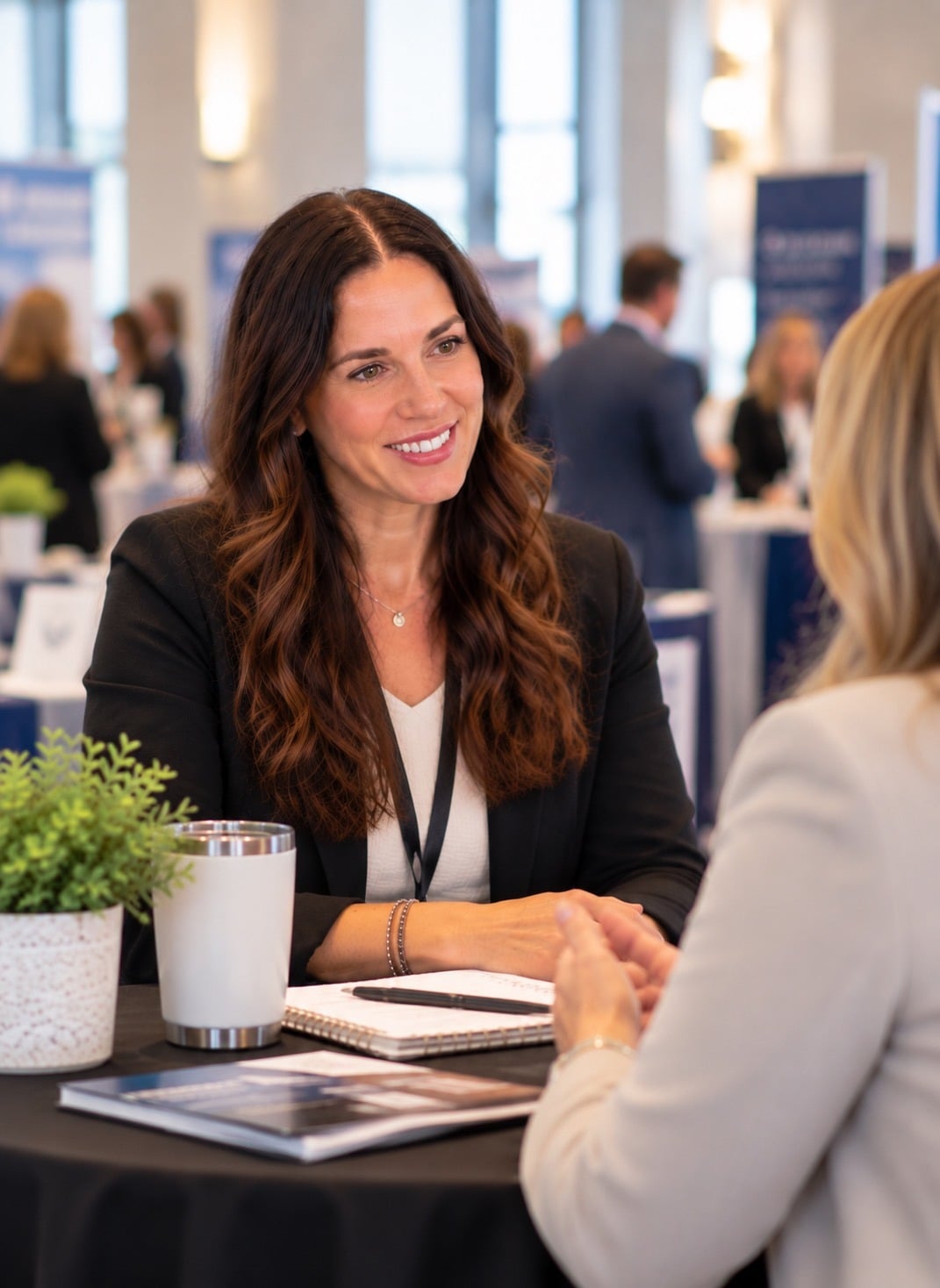Krista in conversation with a client